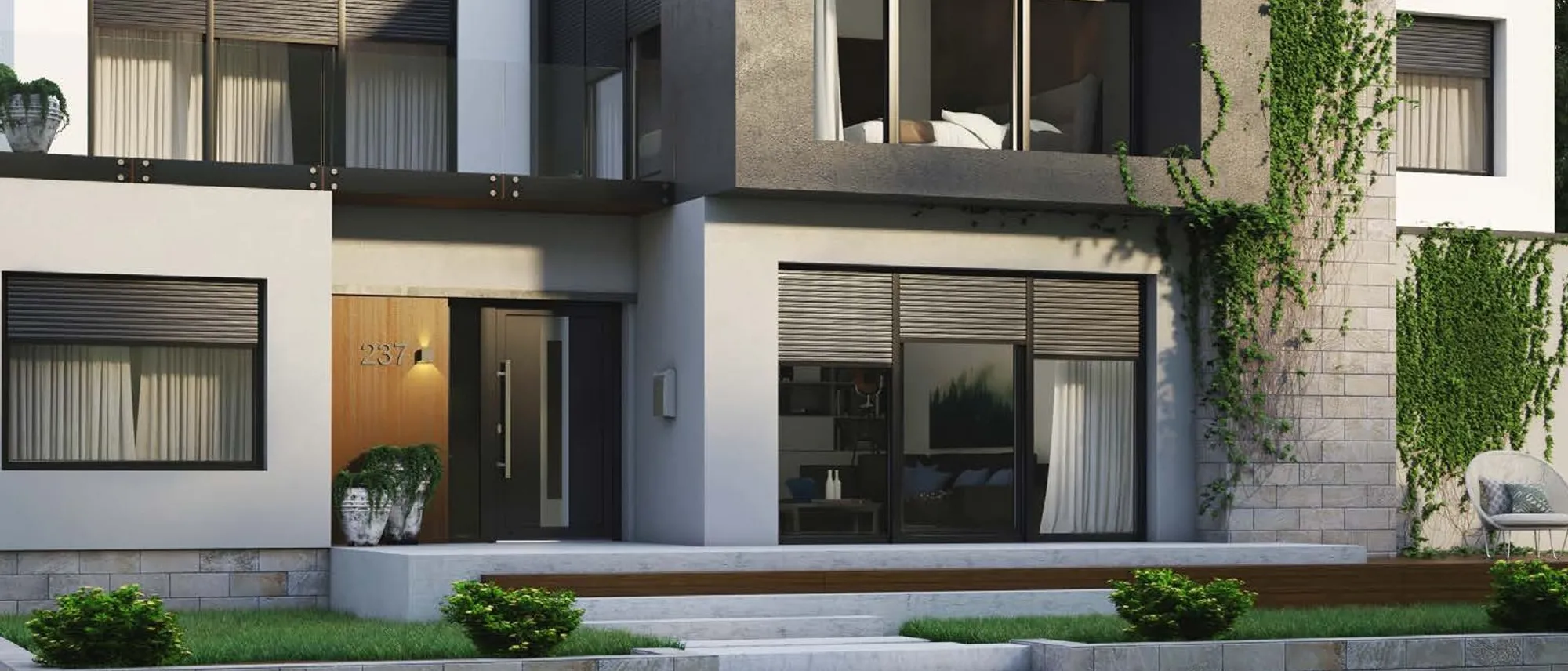 Modernes Wohnhaus mit grossen Fensterflächen und dunklen Rahmen, Motiv aus dem DRUTEX-Prospekt