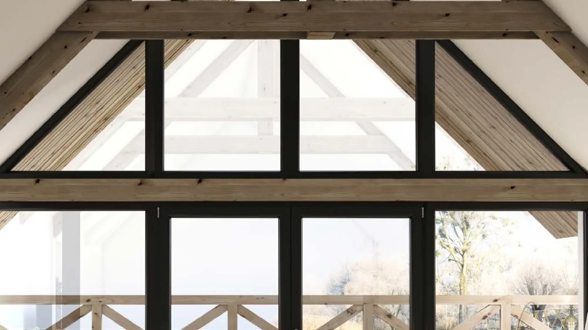 Giebelverglasung unter einem sichtbaren Holzdachstuhl, dahinter eine Balkonbrüstung